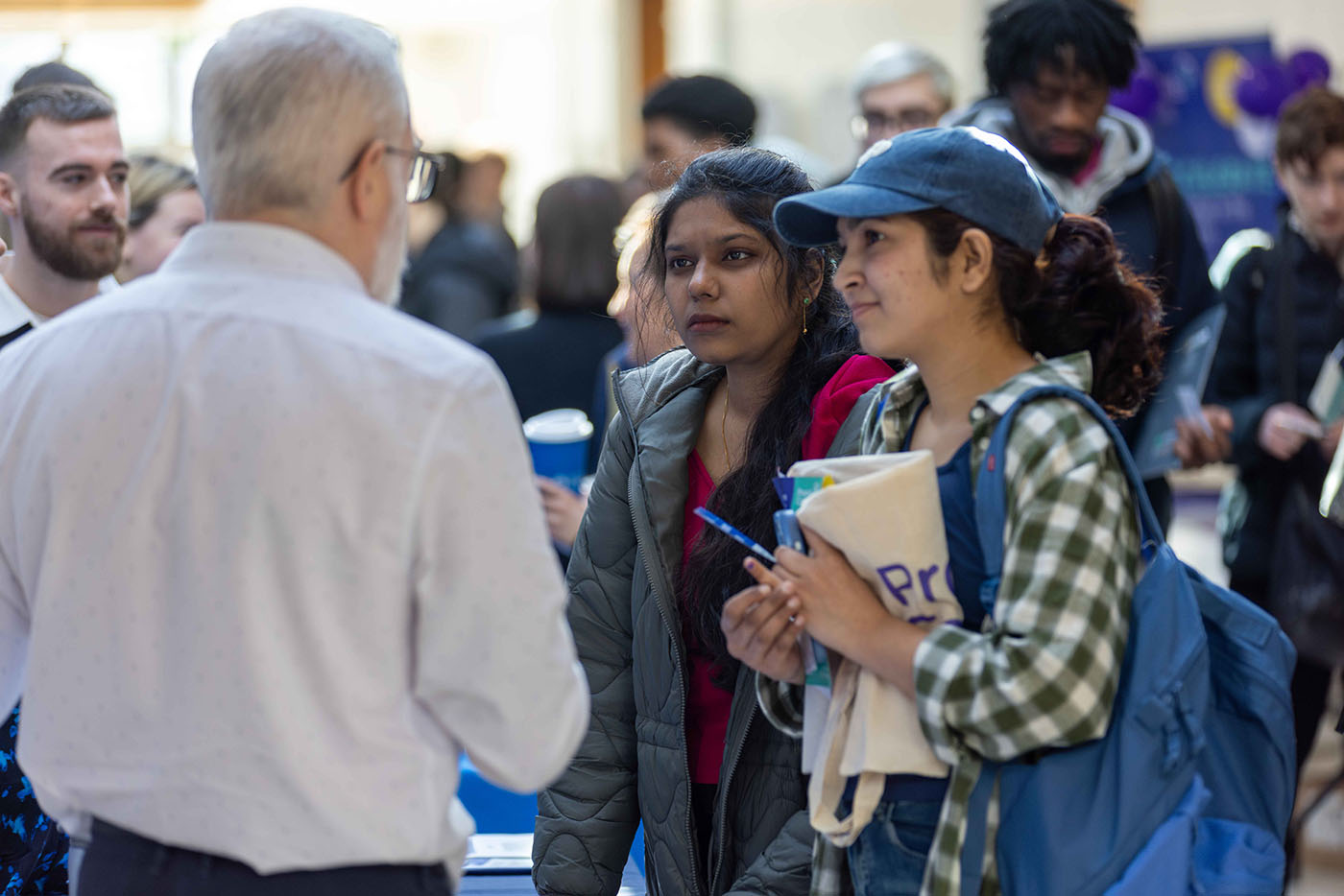 Students discussing career opportunities at the Business and Humanities Careers Fair 